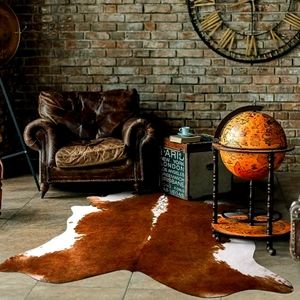 Beautiful cow print rug in excelled condition. The rug is new and never used.